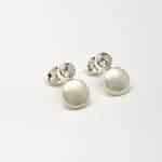 Pendientes de plata con perlas sintéticas y circonita.