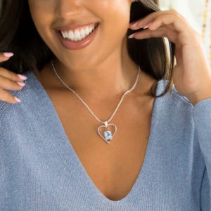 Colgante de plata corazón con topacio azul
