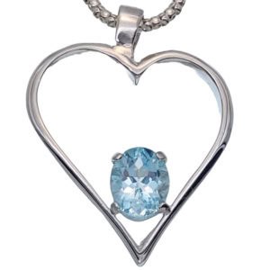 Colgante de plata 44x36 mm. corazón con topacio azul