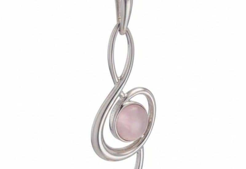 Colgante clave de sol de plata y cuarzo rosa
