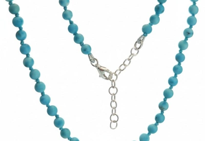Collar nudos de 45 cms. de howlita azul con cierre de plata