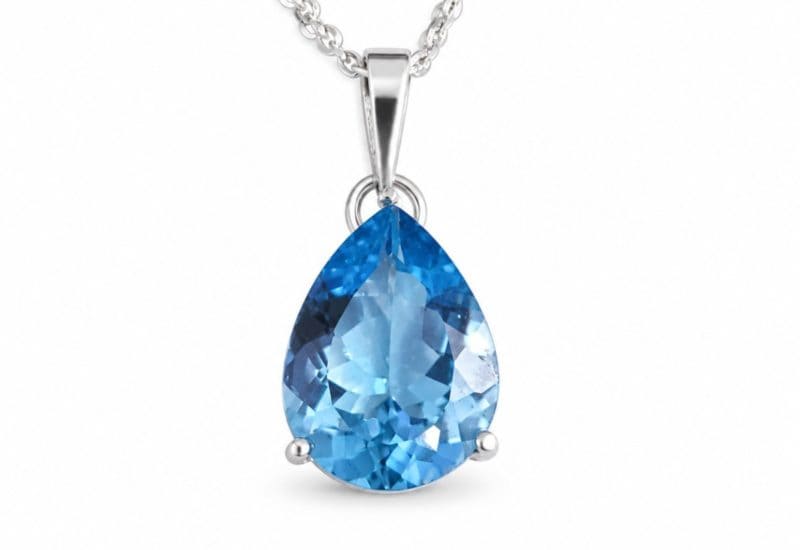 Colgante lágrima de plata con topacio azul